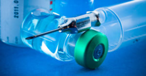 vaccine-vial-blue-bg