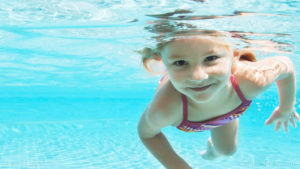 Child-Girl-Swim-Underwater-Pool